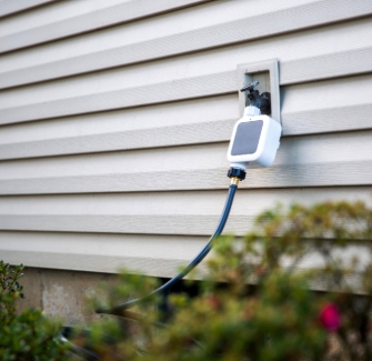 Netro Pixie timer is connected to an outdoor hose faucet. Watering your garden with smart care.